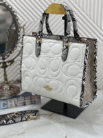 شنطة من كوتش قاعدة 26 سم